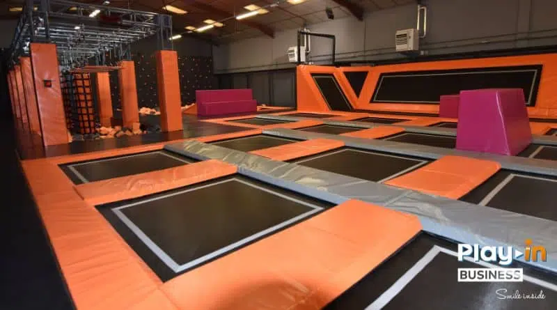 trampoline park with a ninja course and an obstacle course